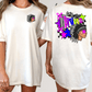 A white t-shirt with a colorful graphic design on the back, featuring a Native American headdress and stars.