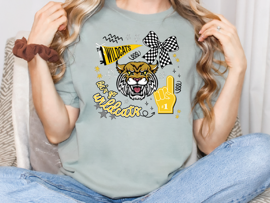 A woman wearing a grey t-shirt with a graphic design featuring a tiger and various text elements.