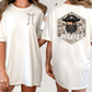 two different views of a white t-shirt with a graphic design on the back. The design features a pirate's face with a bow tie and the word "PIRATES" written below it.