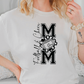 a woman wearing a t - shirt with the letter m on it