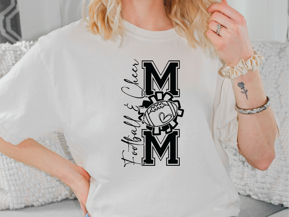 a woman wearing a t - shirt with the letter m on it