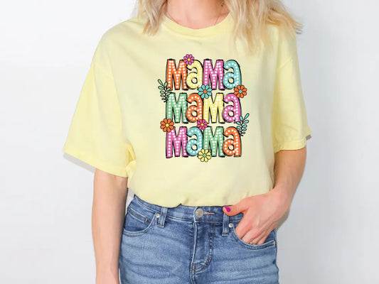 a woman wearing a yellow t - shirt with the word mom on it