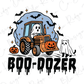 A Halloween-themed illustration featuring a tractor with a ghost driving it, surrounded by bats and pumpkins, with the text "BOO-DOZER" below.