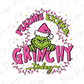 the grinchy thing is wearing a santa hat