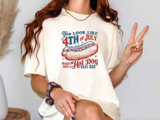 a woman sitting on a chair with a peace sign