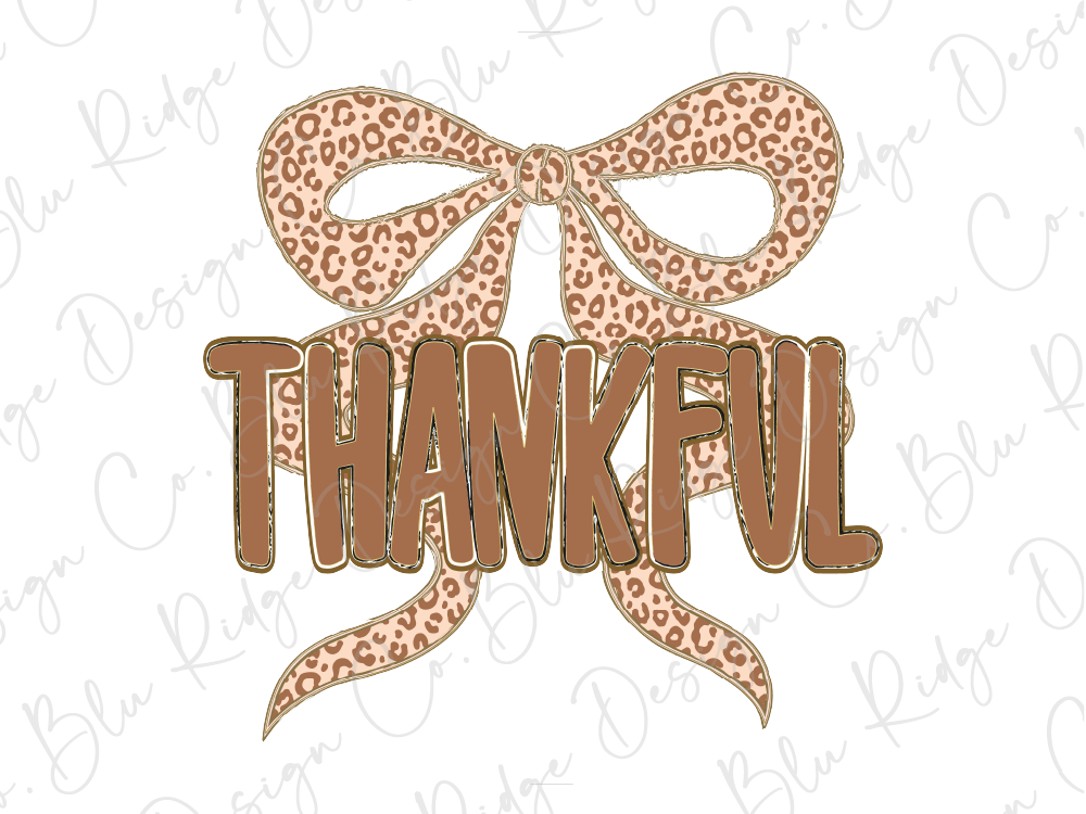 a leopard print bow with the word "THANKFUL" written on it.