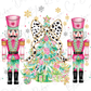 two nutcrackers standing next to a christmas tree