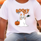 a young boy wearing a booy halloween t - shirt