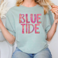 a blonde woman wearing a blue t - shirt with the words blue tide on it