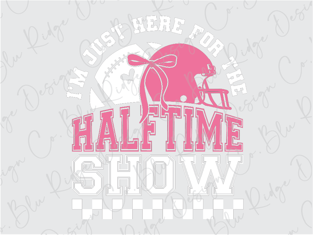 a pink football helmet with the words half time show on it