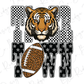 A tiger's head is prominently displayed in the center of the image, with the word "TIGER" written below it in a checkered pattern. A football is also present in the image, placed to the right of the tiger's head.