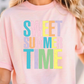 a woman wearing a pink shirt that says sweet summer time