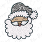 a black and white santa claus face with a polka dot hat