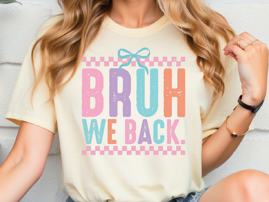 a woman wearing a t - shirt that says bruh we back