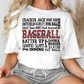 a woman sitting on a couch wearing a baseball shirt