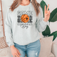 a woman wearing a sweatshirt that says game over with a basketball on it