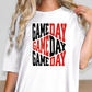 a woman wearing a t - shirt that says game day game day