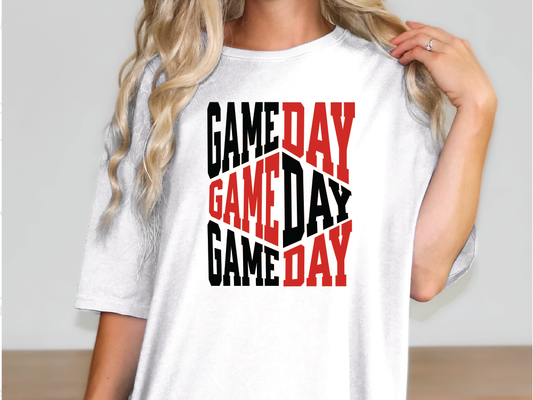 a woman wearing a t - shirt that says game day game day