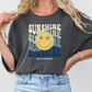 a woman wearing a t - shirt that says sunshine is sunshine