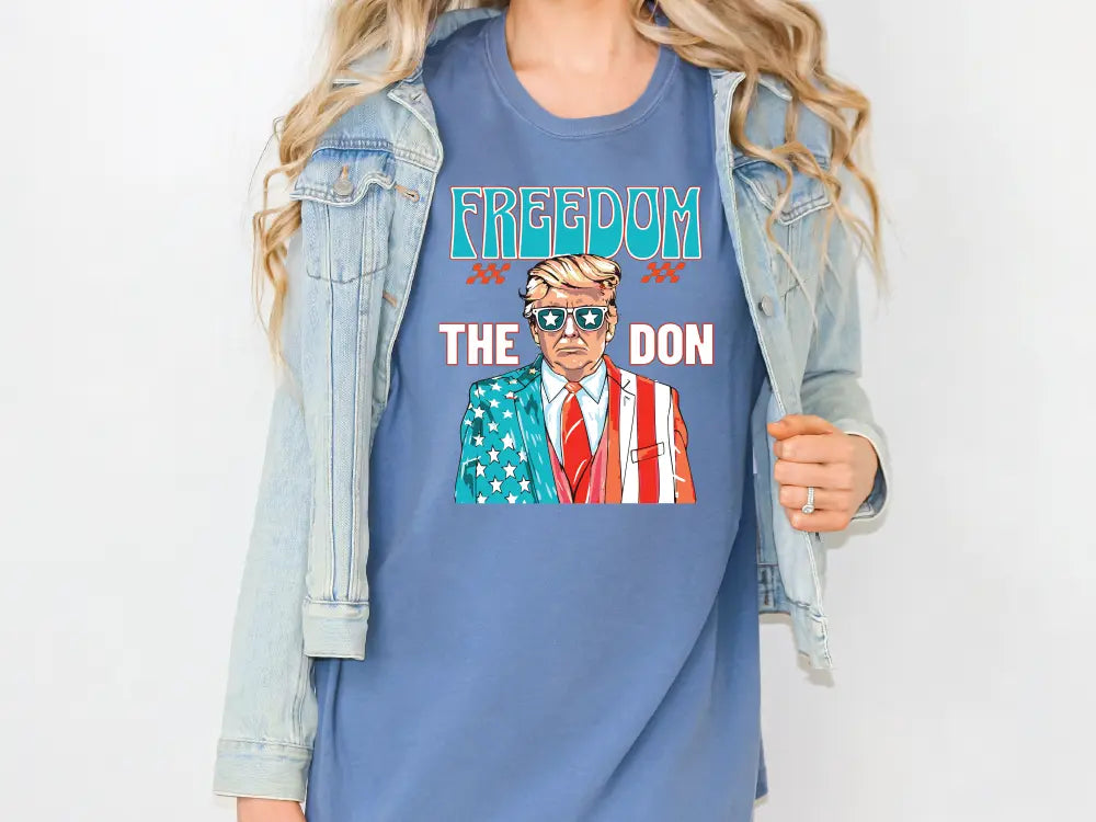 a woman wearing a t - shirt with a picture of a president on it