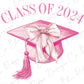 a pink graduation cap with a tassel on it