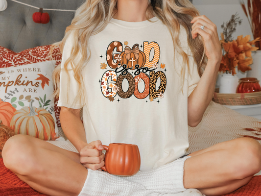 a woman sitting on a bed holding a pumpkin