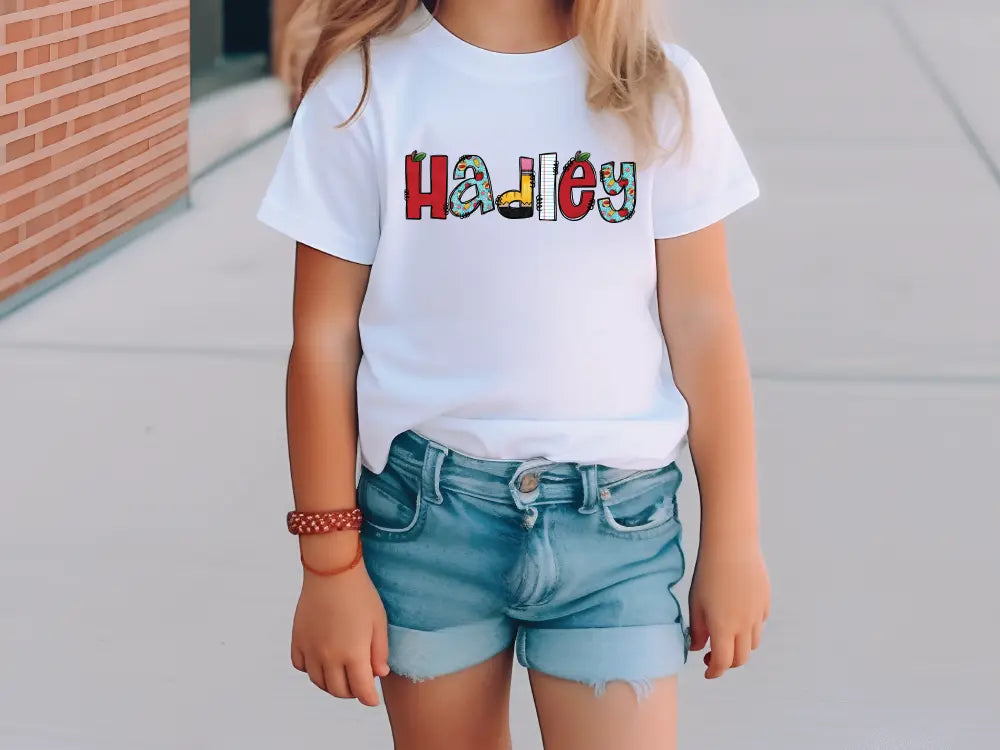 a little girl standing on a sidewalk wearing a hat