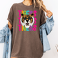 A woman wearing a brown t-shirt with a graphic of a tiger and the text "TIGERS" printed on it.