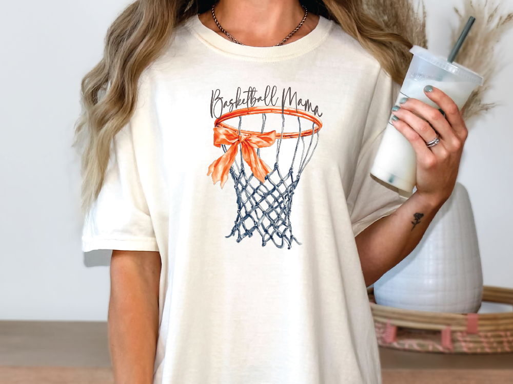 a woman holding a drink and a basketball hoop t - shirt