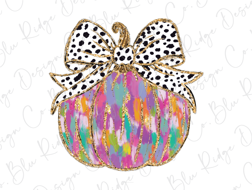 a colorful pumpkin with a polka dot bow