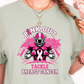 a woman wearing a pink out tackle breast cancer t - shirt