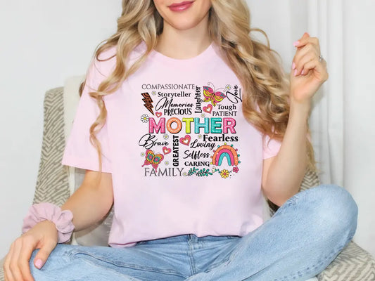 a woman sitting on a chair wearing a pink t - shirt