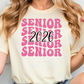 A woman wearing a white t-shirt with pink text that says "SENIOR SENIOR SENIOR SENIOR 2026".