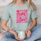 a woman sitting on a couch holding a coffee mug