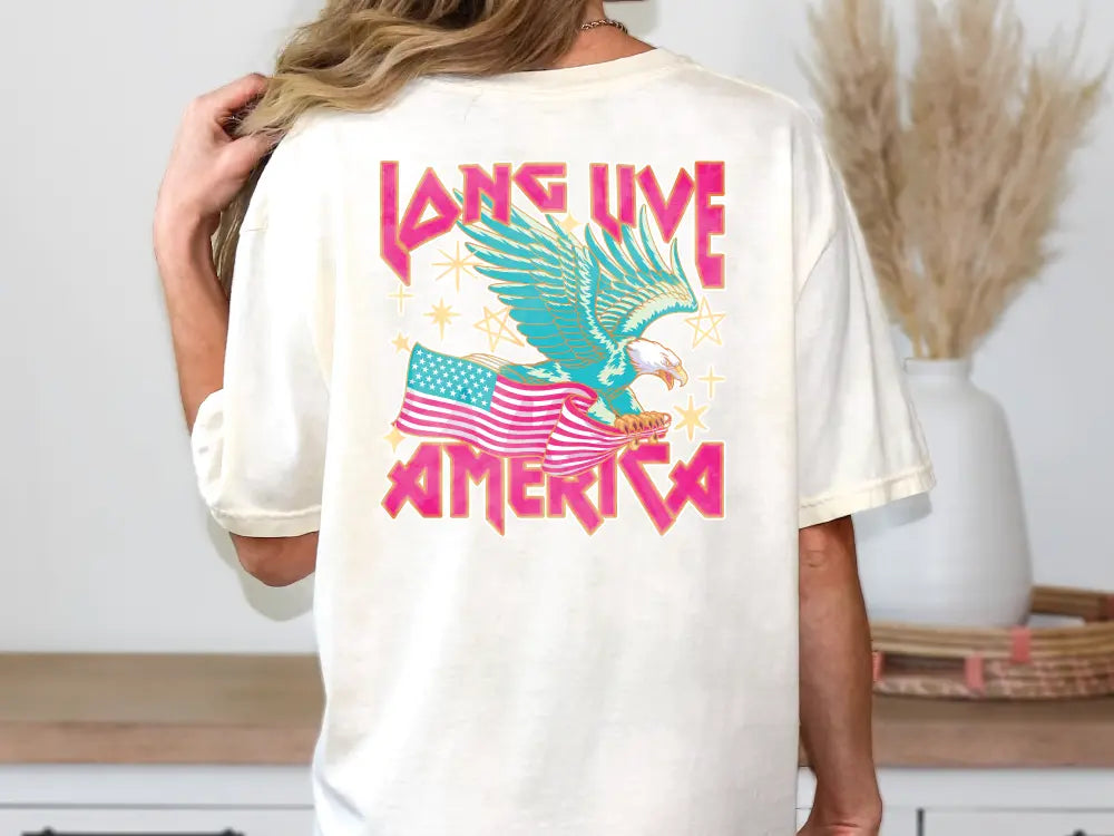 a woman wearing a white t - shirt with an american flag and an eagle on