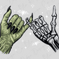 two skeletal hands, one green and one black, making a "pinky" hand gesture.