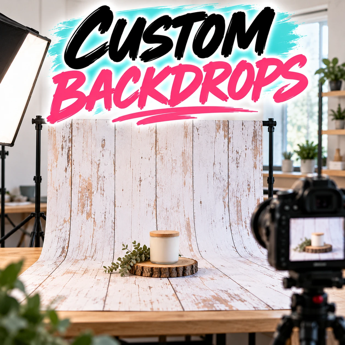 Custom Backdrops from Blu Ridge Design Co, a printed matte vinyl backdrop set up on stands with a candle staged on it and a camera photographing the shot