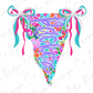 A colorful, floral-patterned banner with the word "Lucky" written on it, adorned with bows and ribbons.