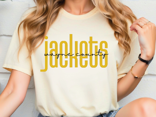 A woman wearing a yellow t-shirt with the text "Wayne County" printed on it.