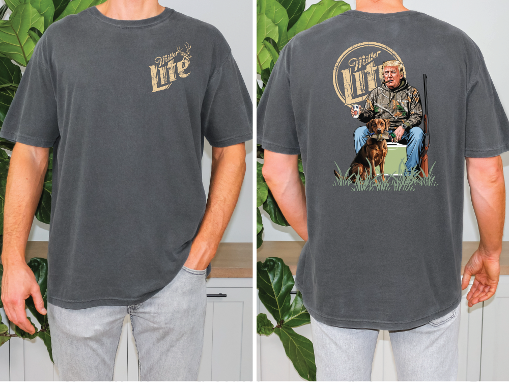 a man wearing a shirt with a picture of a man and a dog on it