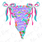 A colorful, floral-patterned design with the word "Rejects" written in a stylized font. The design includes bows and other decorative elements, creating a playful and whimsical appearance.