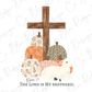 a cross and a bunch of pumpkins with the words the lord is my shepherd