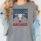 a woman wearing a long sleeve shirt with an american flag design