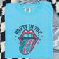 a blue shirt with the rolling stones on it