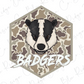 A cartoon illustration of a badger's head, with the word "BADGERS" written below it.