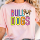 A woman wearing a pink t-shirt with the text "Bulldogs" and an illustration of a bulldog's face.