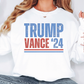 a woman wearing a trump sweater and jeans