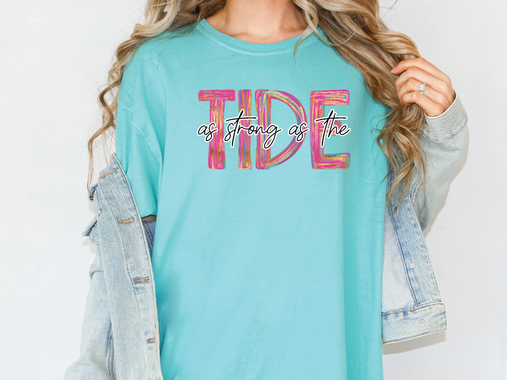 a woman wearing a t - shirt that says tide on it