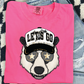 A pink t-shirt with a graphic of a panda wearing a hat with stars and the text "LET'S GO" printed on it.