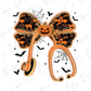 Halloween-themed illustration featuring a large orange bow with a jack-o-lantern design, surrounded by bats and spiderwebs.